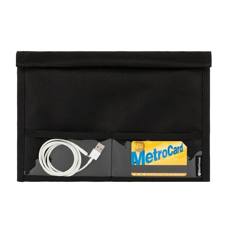 The SLNT Utility Faraday Bag XL [Black] by SLNT features two transparent pockets holding a white USB cable and a yellow MTA MetroCard.