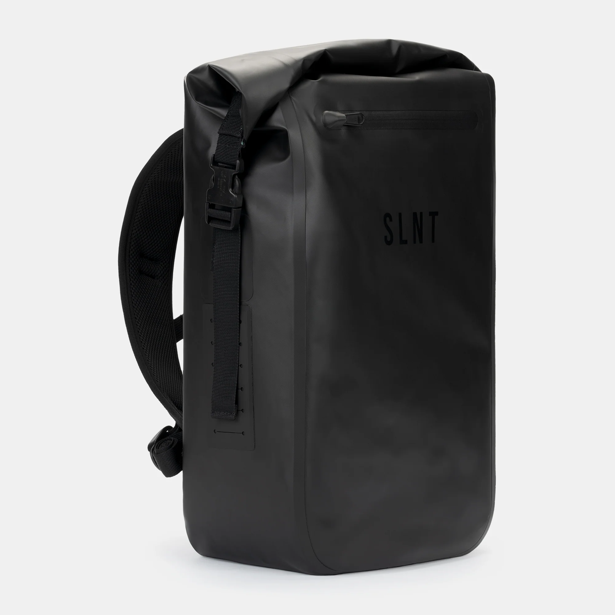 The SLNT Faraday Backpack Dry Bag (20L) is a sleek, black, waterproof backpack featuring a roll-top closure, adjustable padded shoulder straps, and minimalist modern design with the SLNT brand on the front.
