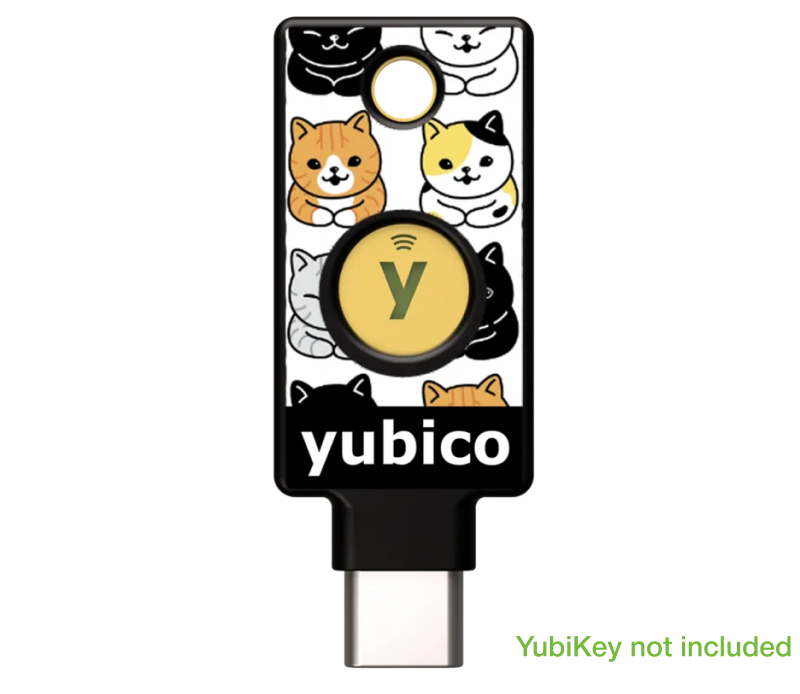 The YubiStyle Cover (YubiCats) by Yubico is a decorative cover with colorful cat designs for your USB security key. Personalize your device with these stylish stickers. “YubiKey not included” appears in the corner.