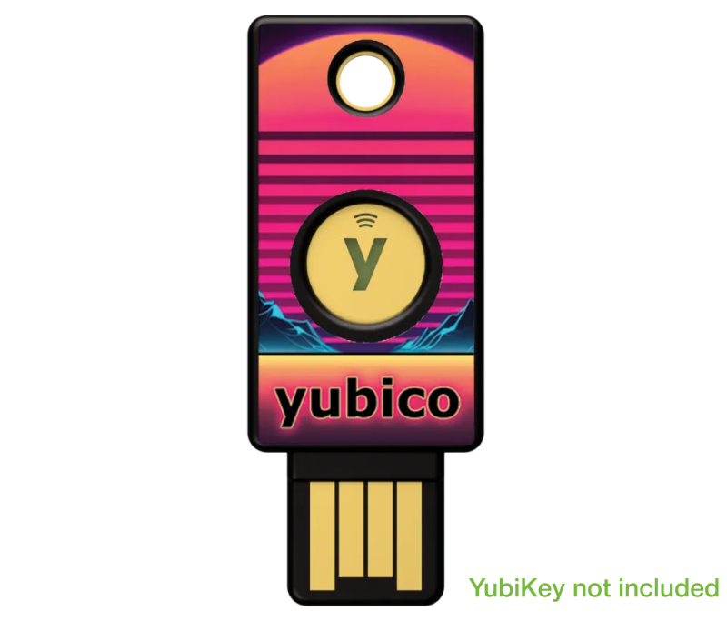 A USB security key is shown with the YubiStyle Cover (Cyber Sunrise) by Yubico, featuring a retro sunset design and large yellow button. "Yubico" appears below, with green text stating "YubiKey not included.