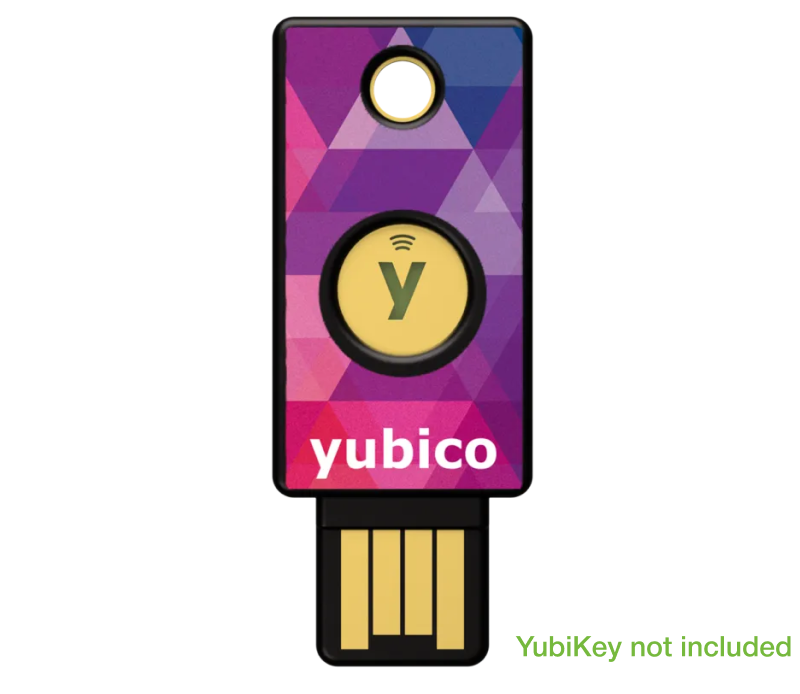 A vibrant YubiStyle Cover (Diamond Prism) by Yubico decorates a USB security key featuring geometric patterns, a yellow button with a "y" symbol, and the Yubico brand below. Green text at bottom right: "YubiKey not included.